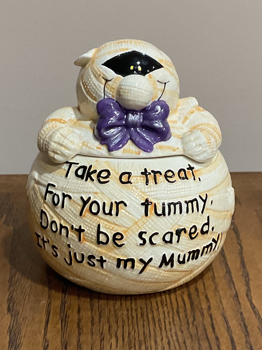 Cream Mummy Treat Jar with Purple Bow Accent